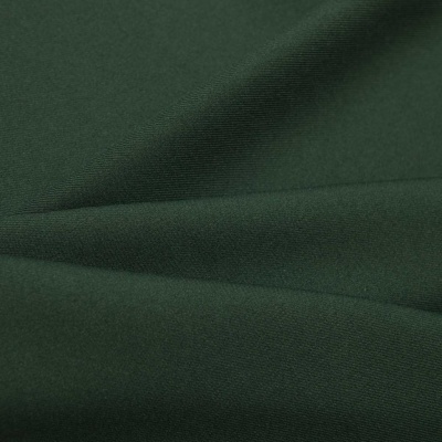 Ткань костюмная 21010 2076, 225 гр/м2, шир.150см, цвет т.зеленый - купить в Череповце. Цена 390.73 руб.